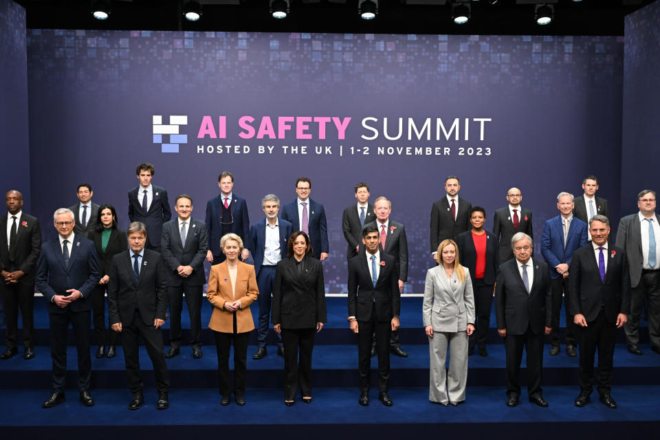 BLETCHLEY, ENGLAND - NOVEMBER 2: (First row L-R) France's Minister for Economy, Finance, Industry and Digital Security Bruno Le Maire, German Economy and Climate Minister Robert Habeck, European Commission President Ursula von der Leyen, U.S. Vice President Kamala Harris, British Prime Minister Rishi Sunak, Italy's Prime Minister Giorgia Meloni, UN Secretary General Antonio Guterres and Australia's Deputy Prime Minister and Minister of Defence Richard Marles, (Middle + Back row L-R) Google's James Manyika, Tino Cuellar, President of the Carnegie Endowment for International Peace, Amba Kak, AI Now Institute, Arthur Mensch, Mistal AI, Adam Selipsky, Amazon Web Services, Nick Clegg, Meta, Yoshu Bengio, Yoshua Bengio, founder and scientific director of Mila at the Quebec AI Institute, Dario Amodei, Anthropic, Sam Altman, OpenAI, Microsoft's Brad Smith, Mustafa Suleyman, Inflection AI, Alondra Nelson, Harold F. Linder Professor at the Institute for Advanced Study, Demis Hassabis, Google DeepMind, Eric Schmidt, Schmidt Futures, Ian Hogarth, chair of the UK frontier AI taskforce and Reid Hoffman, Inflection AI, pose for a family photo on the second day of the UK Artificial Intelligence (AI) Safety Summit at Bletchley Park on November 2, 2023 in Bletchley, England. The UK Government are hosting the AI Safety Summit bringing together international governments, leading AI companies, civil society groups and experts in research to consider the risks of AI, especially at the frontier of development, and discuss how they can be mitigated through internationally coordinated action. (Photo by Leon Neal/Getty Images)